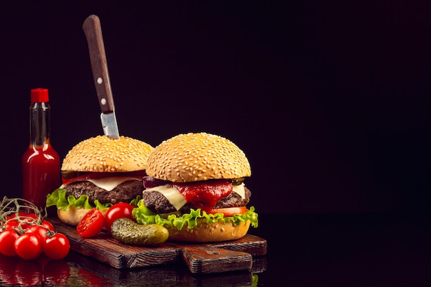 Front view burgers with black background