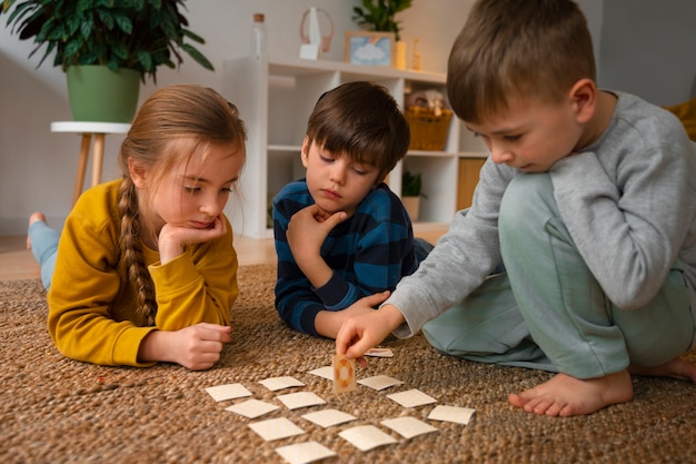 Front view children playing memory game