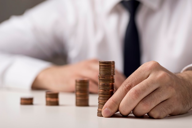 Photo front view of coins held by businessman