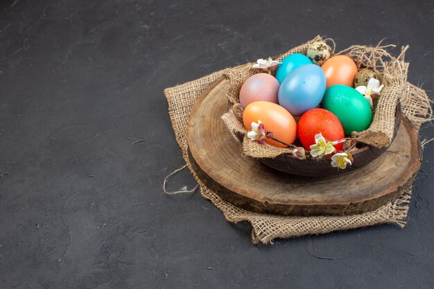 front view colored easter eggs inside plate on dark background holiday colourful bird easter colour spring ornate