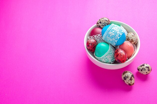 front view colored eggs inside plate on pink surface spring ornate holiday novruz colourful ethnic concept