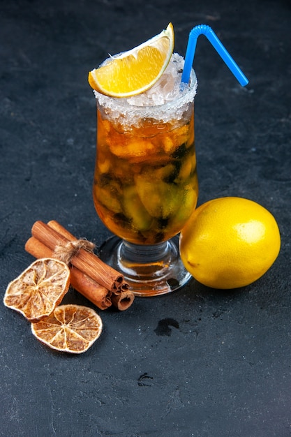 front view cool fruit cocktail with straw on dark background bar ice cold juice color party summer drink fresh