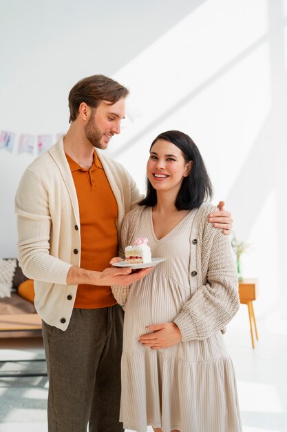 Front view couple at gender reveal party