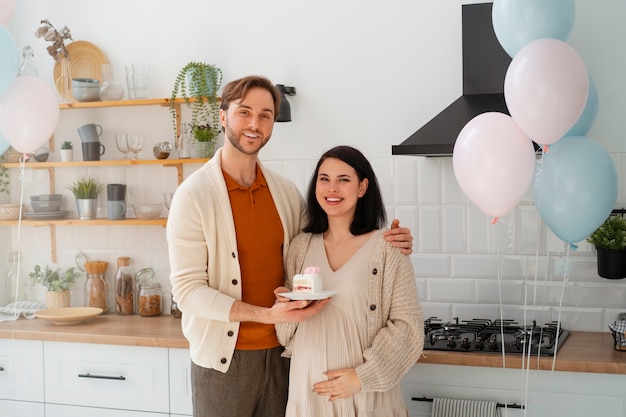 Front view couple at gender reveal party