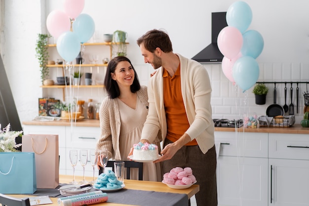 front view couple at gender reveal party