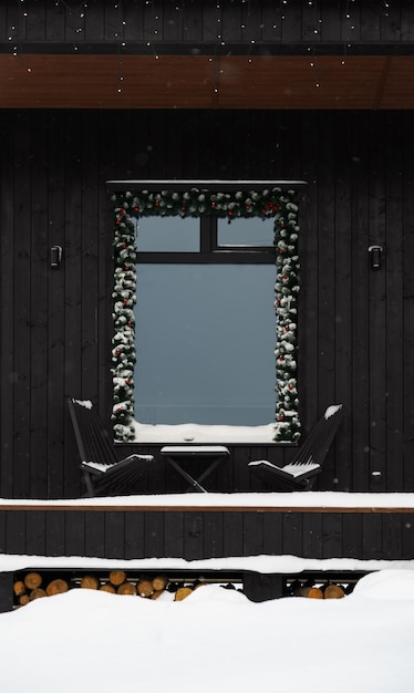 Front view of decorated house patio with outdoor furniture