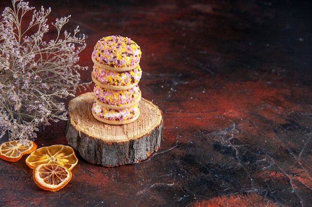 front view delicious biscuits on dark background horizontal pie sugar tea sweet cake cookies