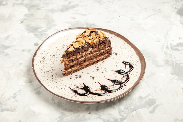 front view delicious cake slice inside plate on white background dessert sweet biscuit ice-cream pie cake cookie tea