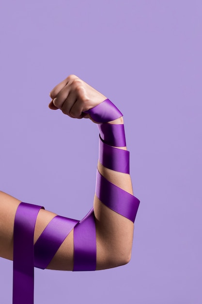 Photo front view of flexing arm with ribbon