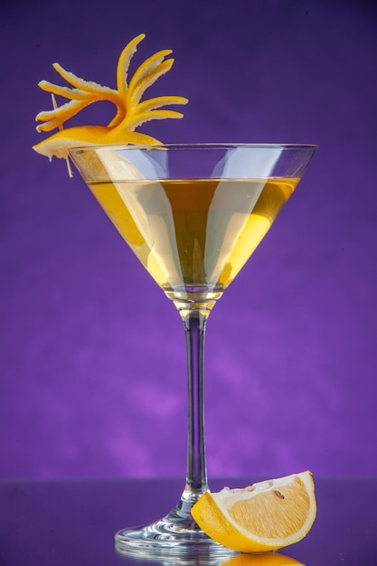 front view fresh drink inside cocktail glass on purple background bar ice cold drink juice color summer party