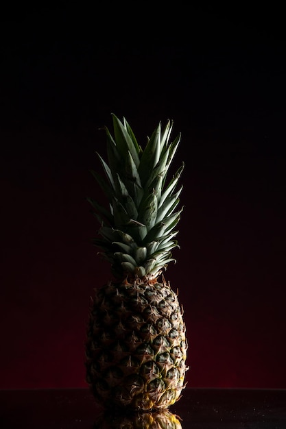 front view fresh pineapple on dark background