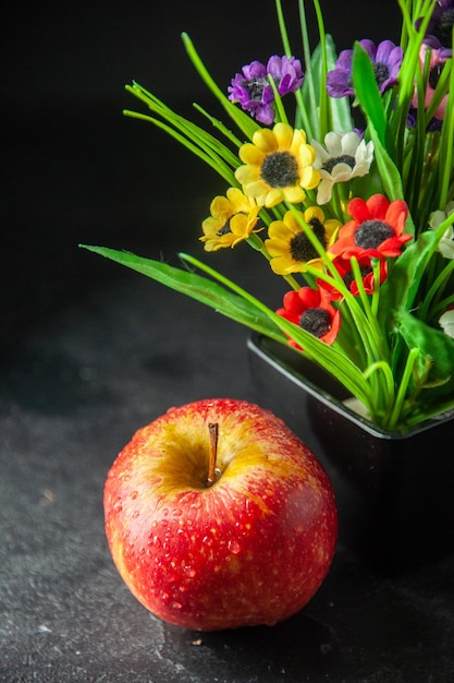 front view fresh red apple with flowers on dark background photo tree color mellow pear juice fruit