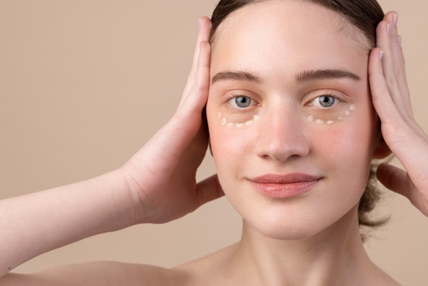 Front view girl with dots under eyes