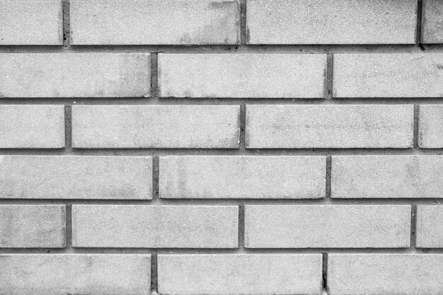 Front view of gray brick wall background and texture