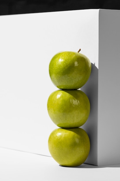 Front view of green apples next to podium