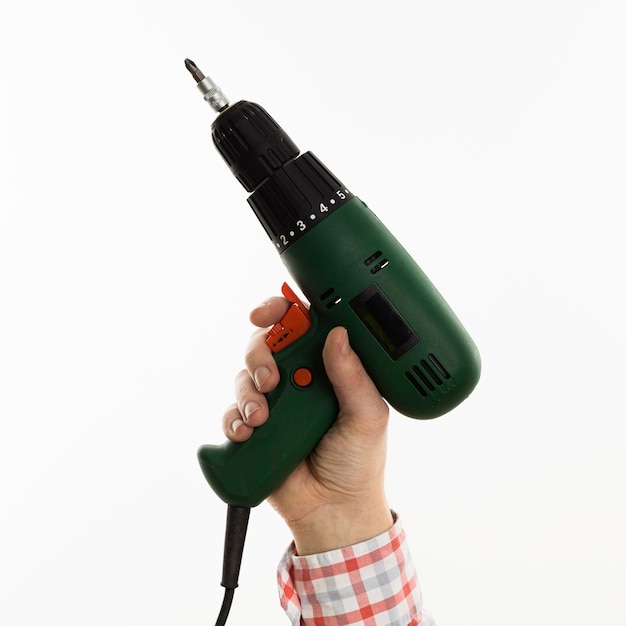 Photo front view of hand holding power drill