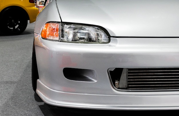 Front view headlamp gray car