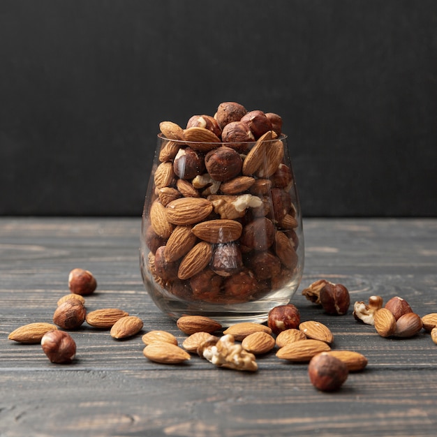 Front view of jar with almonds and other nuts