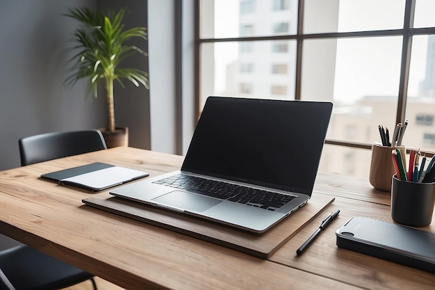 Front view of laptop on wood table in office