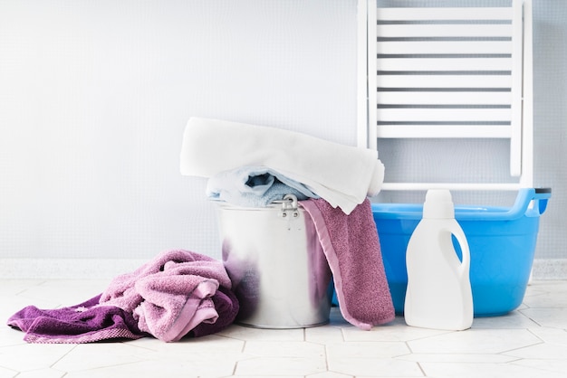 Photo front view laundry baskets with detergent