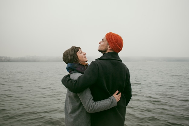 Photo front view of lovely couple outside