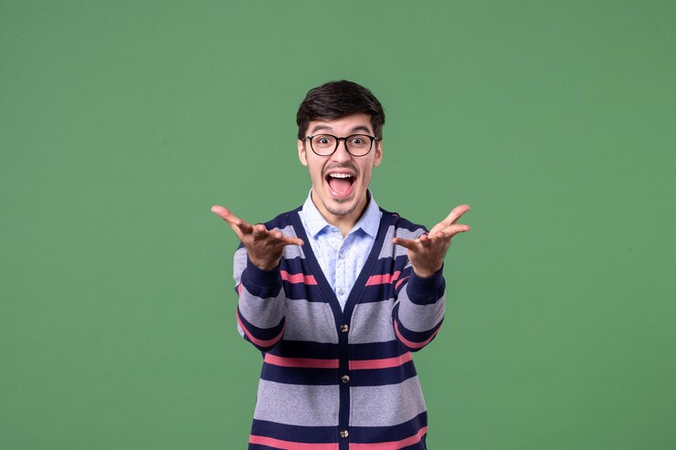 front view male teacher with excited face on green background student lesson worker color school college book library