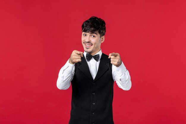 Front view of male waiter in a uniform