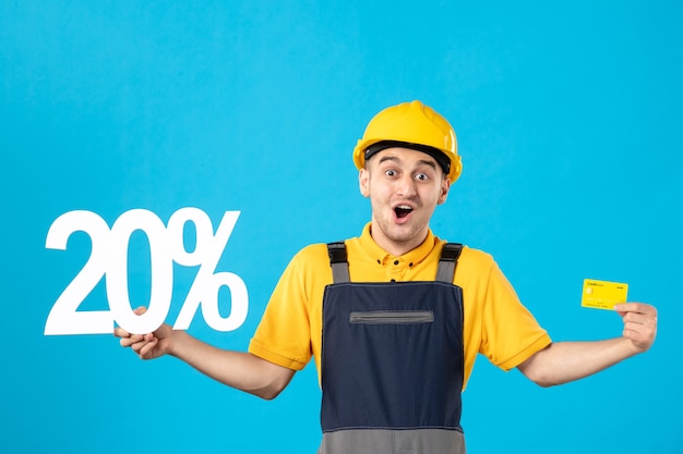 Front view male worker in uniform with writing and credit card blue 