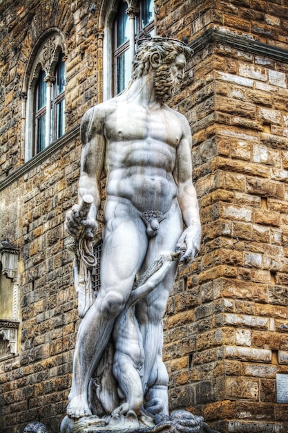 Front view of Neptune statue in Piazza della Signoria in Florence Italy