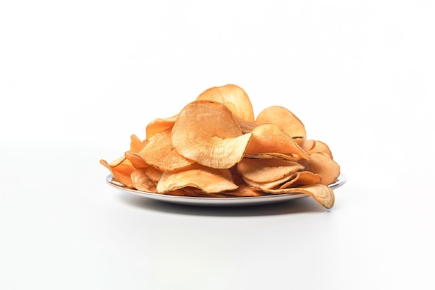front view a plate of potato chips isolated on white background
