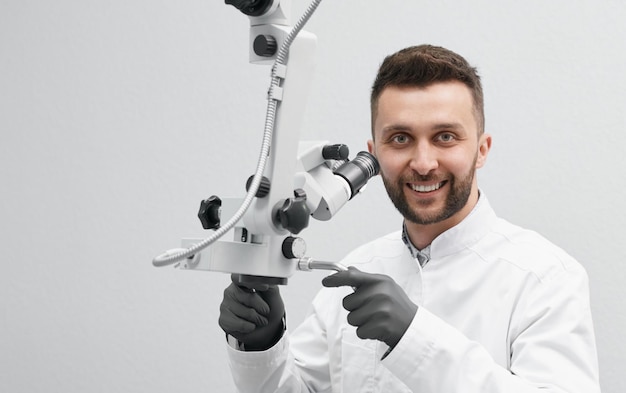 Front view of professional dentist on isolated background