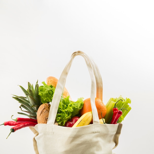 Front view of reusable bag with vegetables and fruit