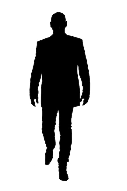 front view of a silhouette of a bald man walking and dressed in a jacket