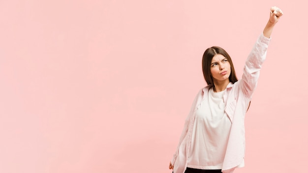 Front view strong woman in studio