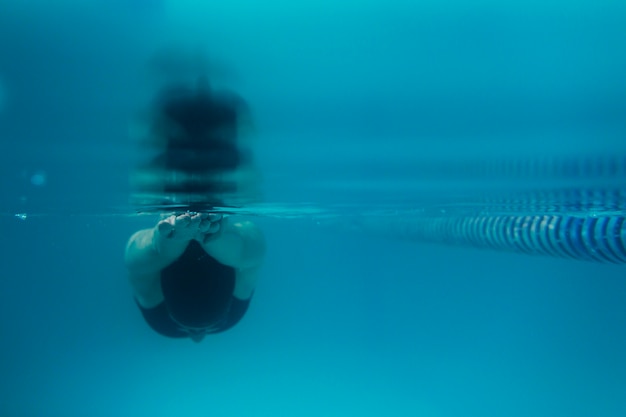 Front view of swimmer diving