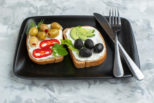 Front view tasty sandwiches with cucumbers and olives on white background lunch burger horizontal health meal toast food bread