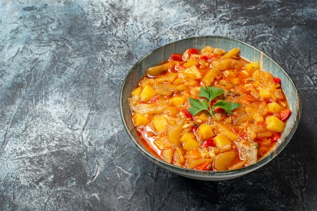 Front view tasty vegetable meal inside plate on a gray background food dinner meal color kitchen color