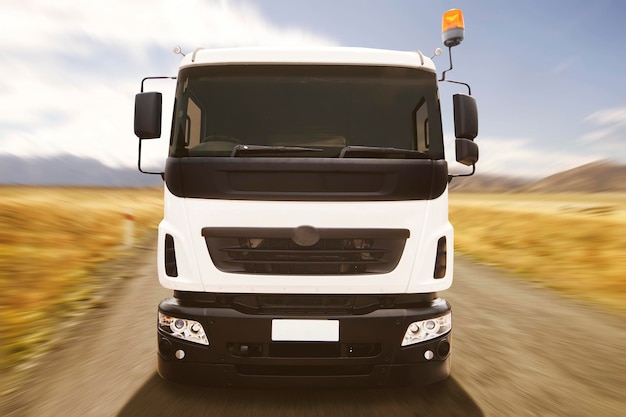 Front view of truck on the gravel road