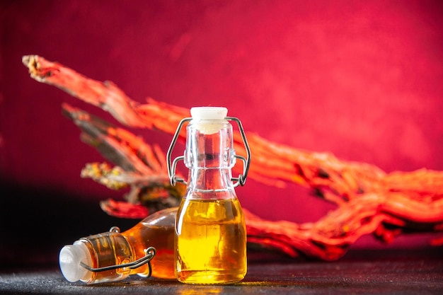 front view vegetable oil in little glass can on a pink background sunflower food calorie meal olive color salad