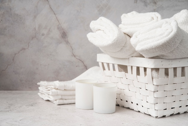 Front view white basket with towels