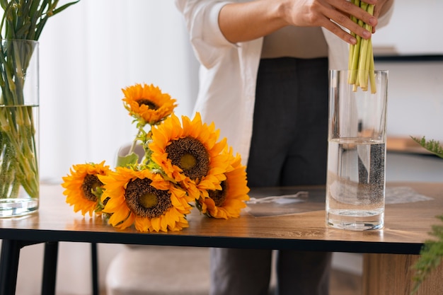 Front view woman with sunflowers