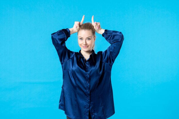 front view young female in pajamas on blue background night color sleep bed party tired rest woman yawn dream nightmare
