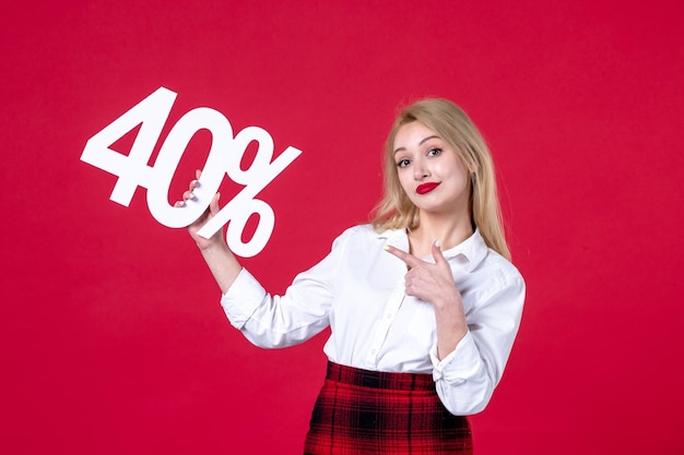 Front view young female posing with on red background fashion shopping equality mall affectionate femininity sensual feminine horizontal