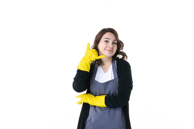 front view young female in yellow gloves on a white background garden tree woman scent ground nature color flower gardener