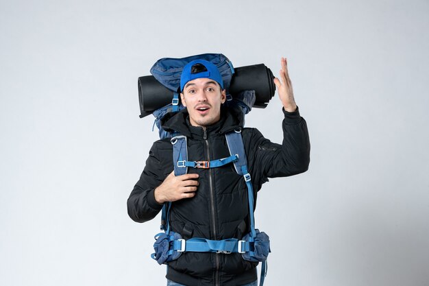 front view young male with backpack going in hiking on white background air nature forest mountain campaign height tent
