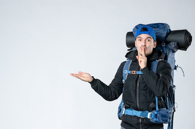 front view young male with backpack on white background snow campaign mountain sky height nature forest air tent