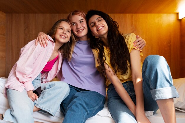 Front view young women in a hostel