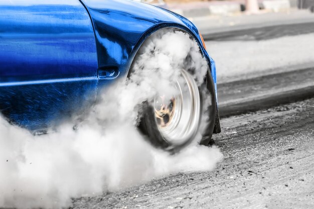 Front wheel drive drag racing car at start line