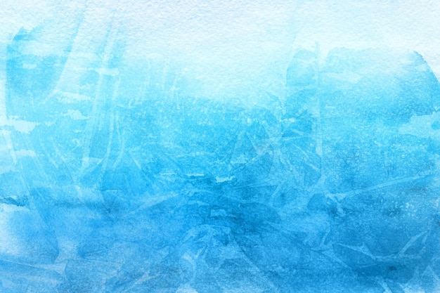 Photo frosted winter blue watercolor background painted on white paper