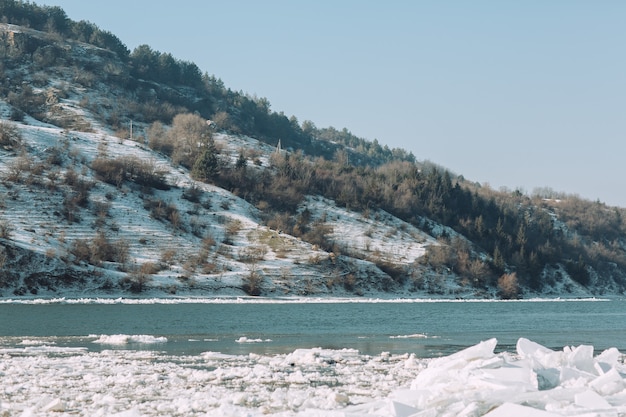 Frosty winter day on the river in sunny day